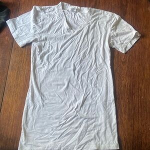 V-Neck white shirt, size large.